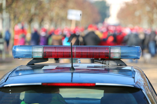 vehicle of the police during the demonstration with the rioter