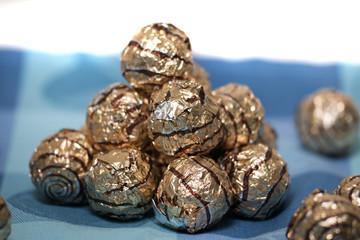 Pile of sweet round chocolate candies
