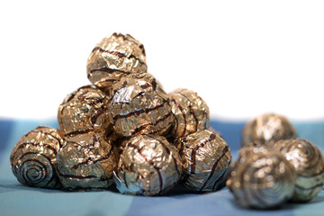 Pile of sweet round chocolate candies