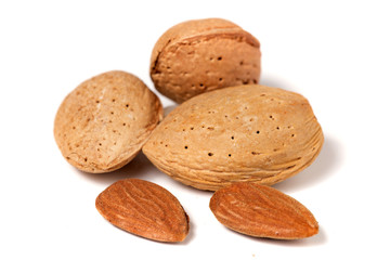 Sweet almonds on white background