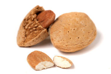 Sweet almonds on white background