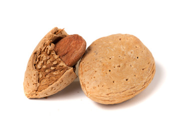 Sweet almonds on white background
