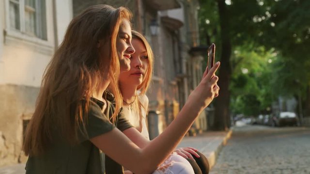 Slow motion shot of women taking selfie