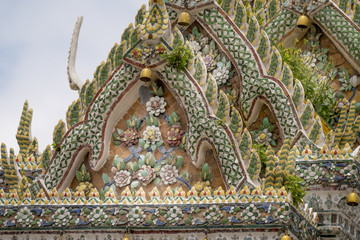Fototapeta na wymiar Detail of Flower Carvings at Wat Arun Temple, Bangkok, Thailand