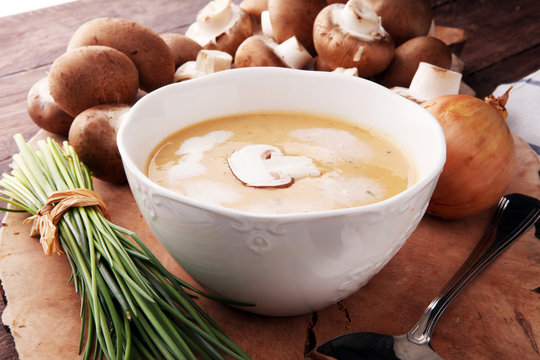 Mushroom cream soup with herbs and champignons