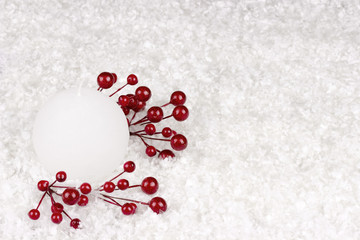 Christmas decoration with sprigs snow red berrys.