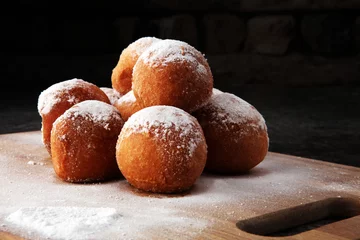 Zelfklevend Fotobehang German donuts.  berliner or quarkbällchen with jam and icing sugar. © beats_