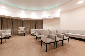 Row of chairs in boardroom. seats in an empty conference room