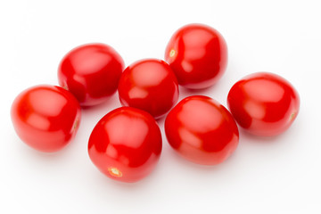 Plum tomatoes isolated on white background. Top view