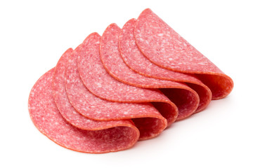 Salami slices isolated on the white background.
