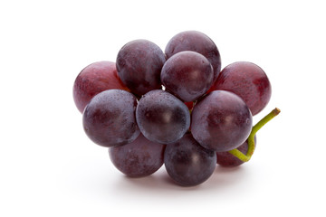 Ripe red grape isolated on white.