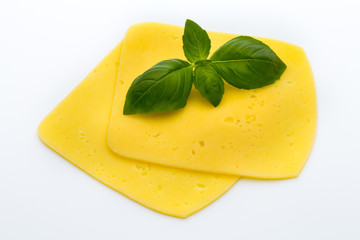 Cheese slices on the white background.