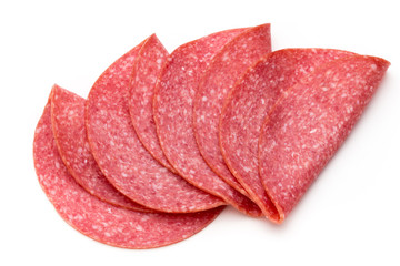 Salami slices isolated on the white background.
