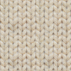 Seamless Texture of Knitted Sweater. Repeating pattern of beige knitted sweater
