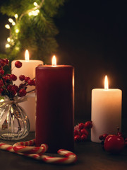 Candles for cold weather. Christmas celebration or cold winter evening concept