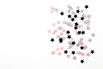 Christmas stars on white background, flat lay, top view
