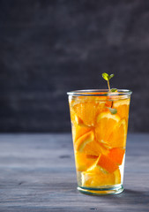 Detox Infused Water with orange.Healthy Beverage.Food  diet concept.Vegetarian.Copy space for Text. selective focus.
