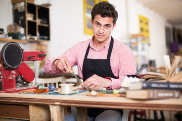 Fototapeta premium Carpenter working in studio
