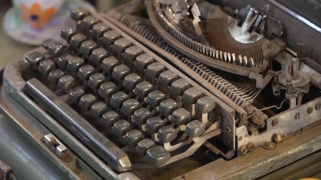 Old, vintage typewriter in the antiquarian store.