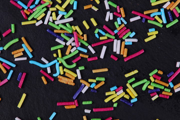 Colorful sprinkles close up background