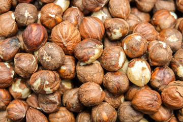 Close up top view of nuts hazelnut. Oriental treats. Background of nuts texture.