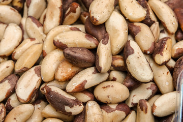 Tasty brazilian nut background. Horizontal image. Background of nuts texture.