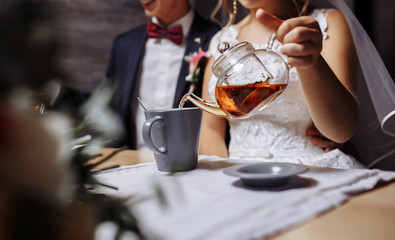 Couple drink tea. Good time in restraunt