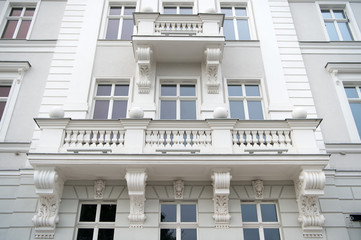 House facade with windows, balconies in wroclaw, poland