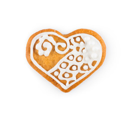 Gingerbread in the form of heart - Christmas homemade sweet cookie, isolated on white background