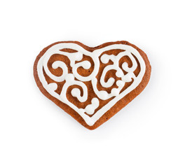 Gingerbread in the form of heart - Christmas homemade sweet cookie, isolated on white background
