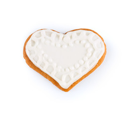 Gingerbread in the form of heart - Christmas homemade sweet cookie, isolated on white background