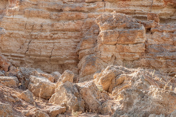 Yellow rocky mountain cliff natural texture wall background