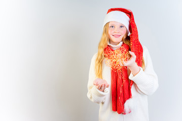 Girl wearing christmas cap