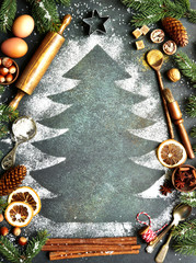 Rustic christmas baking background with ingredients for making cookies or cake .Top view with space for text.