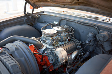 Close-up of the engine of an old American car