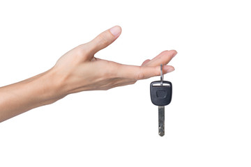 Hand holding car key isolated on white background