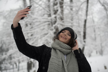 young woman taking selfie 