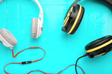 Headphones on wooden desk table - Music concept