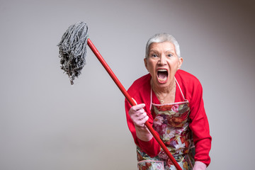 Cleaning senior lady had enough, threatening to beat you with a mop