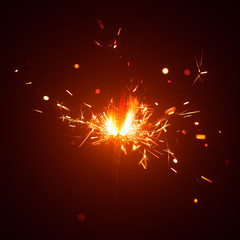 Obraz premium Christmas sparkler in haze with red light