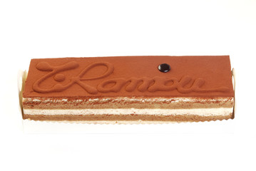 Delicious tiramisu cake on white background 