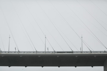 The guys of the bridge across the Golden Horn Bay in Vladivostok