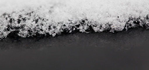 close up on fresh snow - holiday background