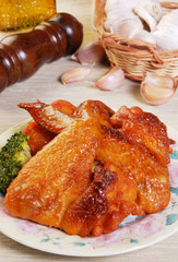 Grilled chicken wings served on a plate    