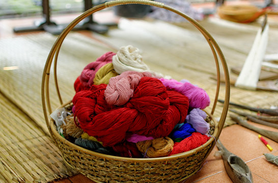 Thai Weaving : Tools and Colorful yarns.