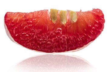 Closeup view of red pomelo pulp with seeds isolated on white background. Thailand Siam ruby pomelo...