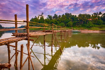 Beautiful view of a bamboo bridge. Laos landscape.