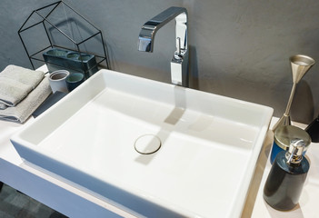 Interior of bathroom with sink basin faucet and mirror. Modern design of bathroom