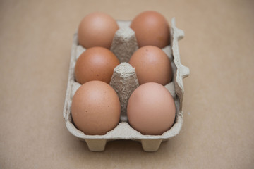 Fresh eggs in cardboard box