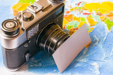 The concept of travel - the camera is on the map.